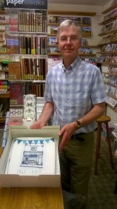 John Barratt and celebration cake for 70 years in business