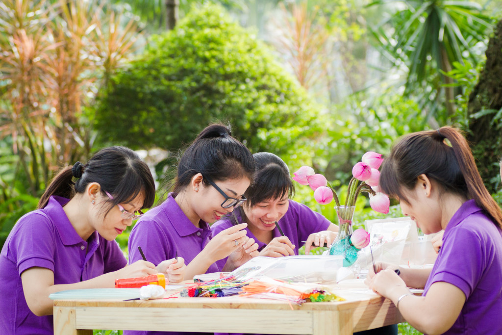Above: Some of Quilling Card’s craftspeople at work in Vietnam.