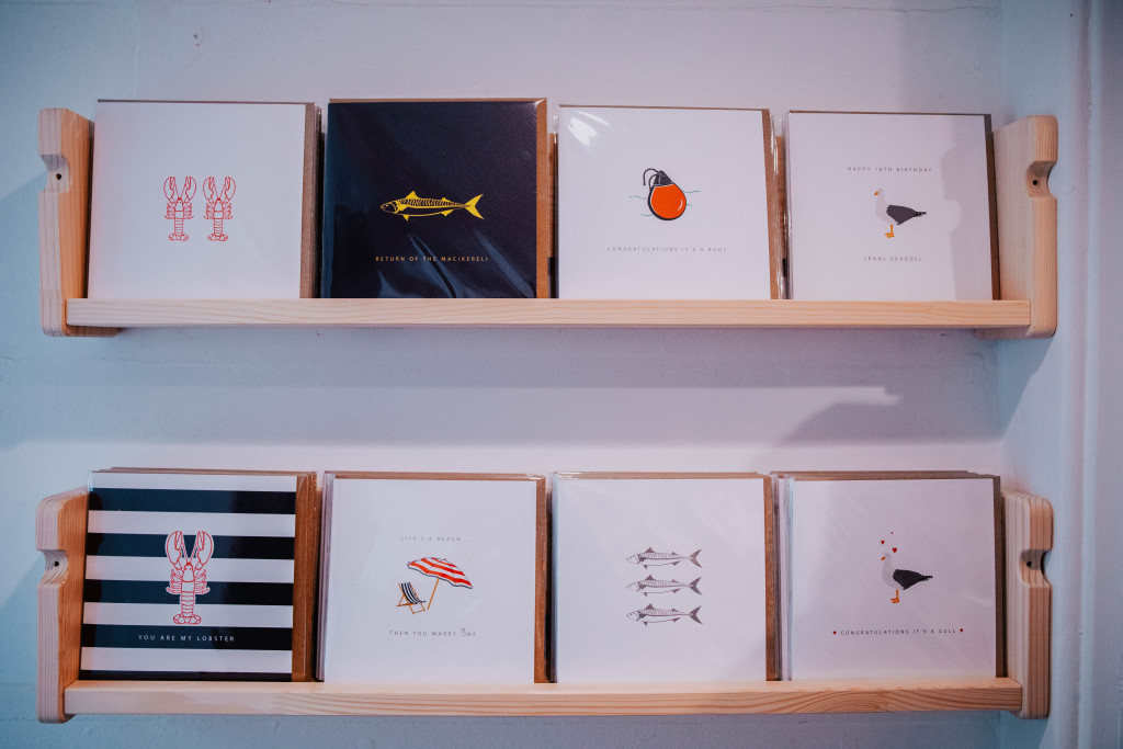 Above: Some of the greeting cards that are designed by Ainslie for the shop.