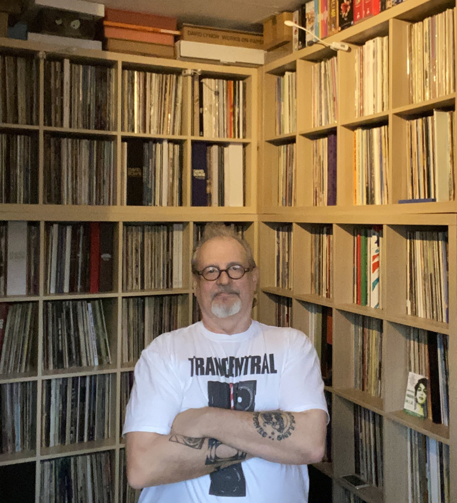 Above: Chris Leaning, surrounded by just part of his vast music collection.