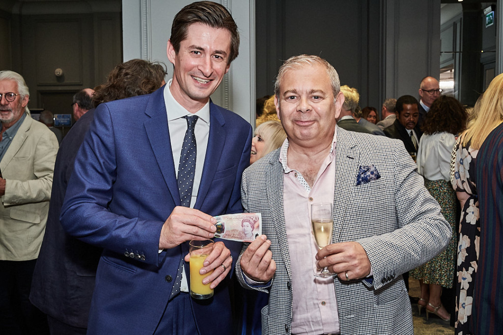 Above: As well as winning two awards at The Retas yesterday, House Of Cards’ Miles Robinson (right) received £50 from Postmark’s Mark Janson-Smith having bet July 7 as Boris’ resignation date