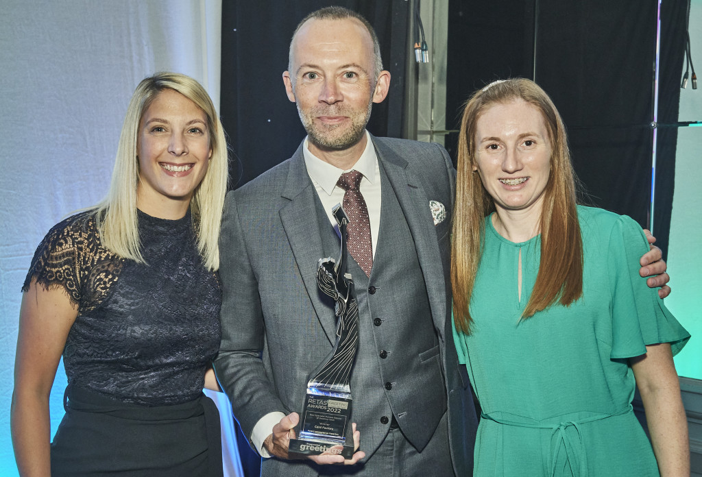 Above: Card Factory’s chief operating officer Adam Dury with colleagues Sam Bradley (left) and Linda Booth at The Retas 2022 with their trophy