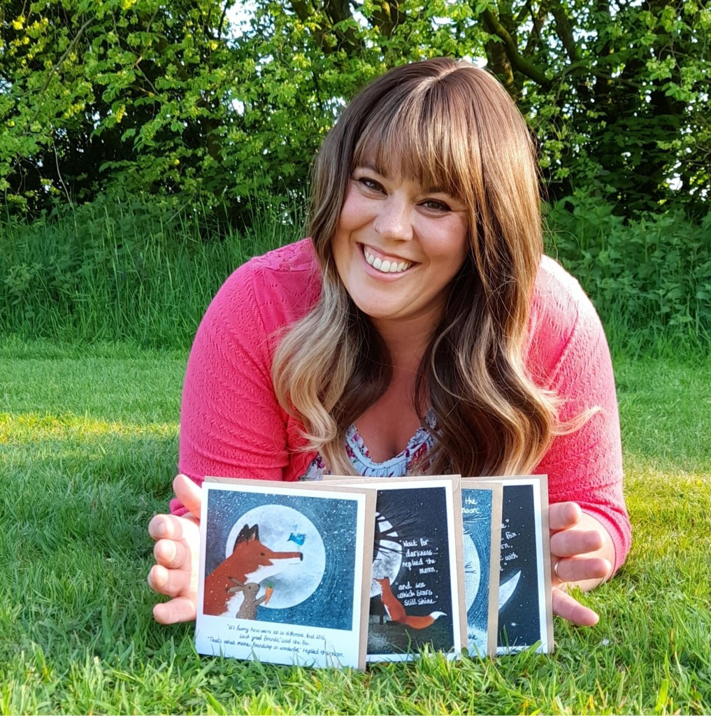 Above: Stacey shows off her greeting cards