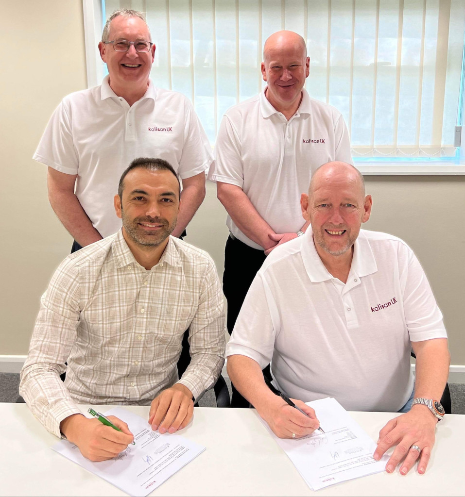 Above: Kalisan Turkey’s Ozkan Erden (front left) signs on the dotted line with Richard Aylett, Kalian UK, watched by Northwest Greetings staff Tony Maden and Jason Knowles