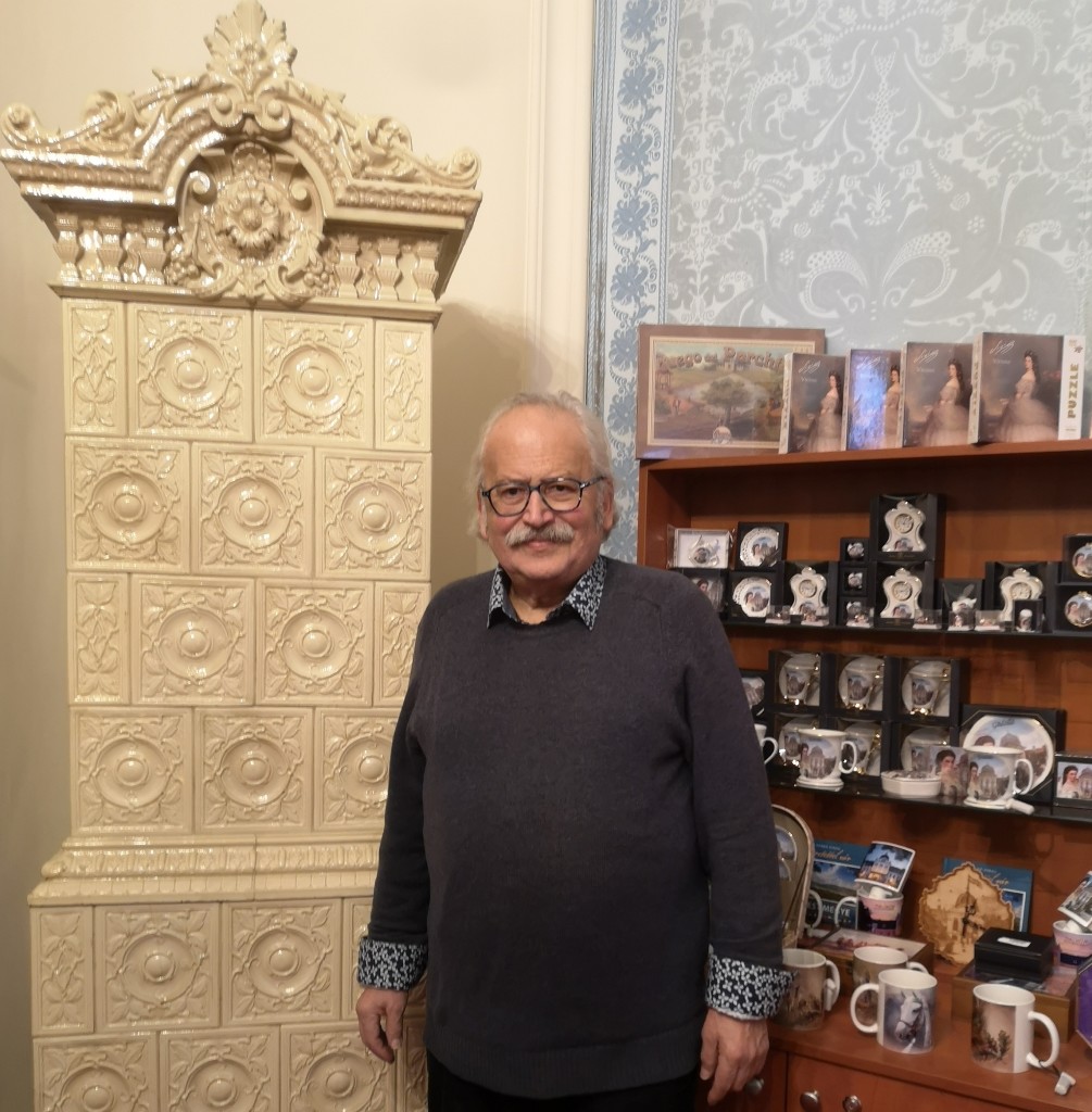 Above and top: Marius Szanto in the gift shop of the Royal Palace in Hungary, which he supplies