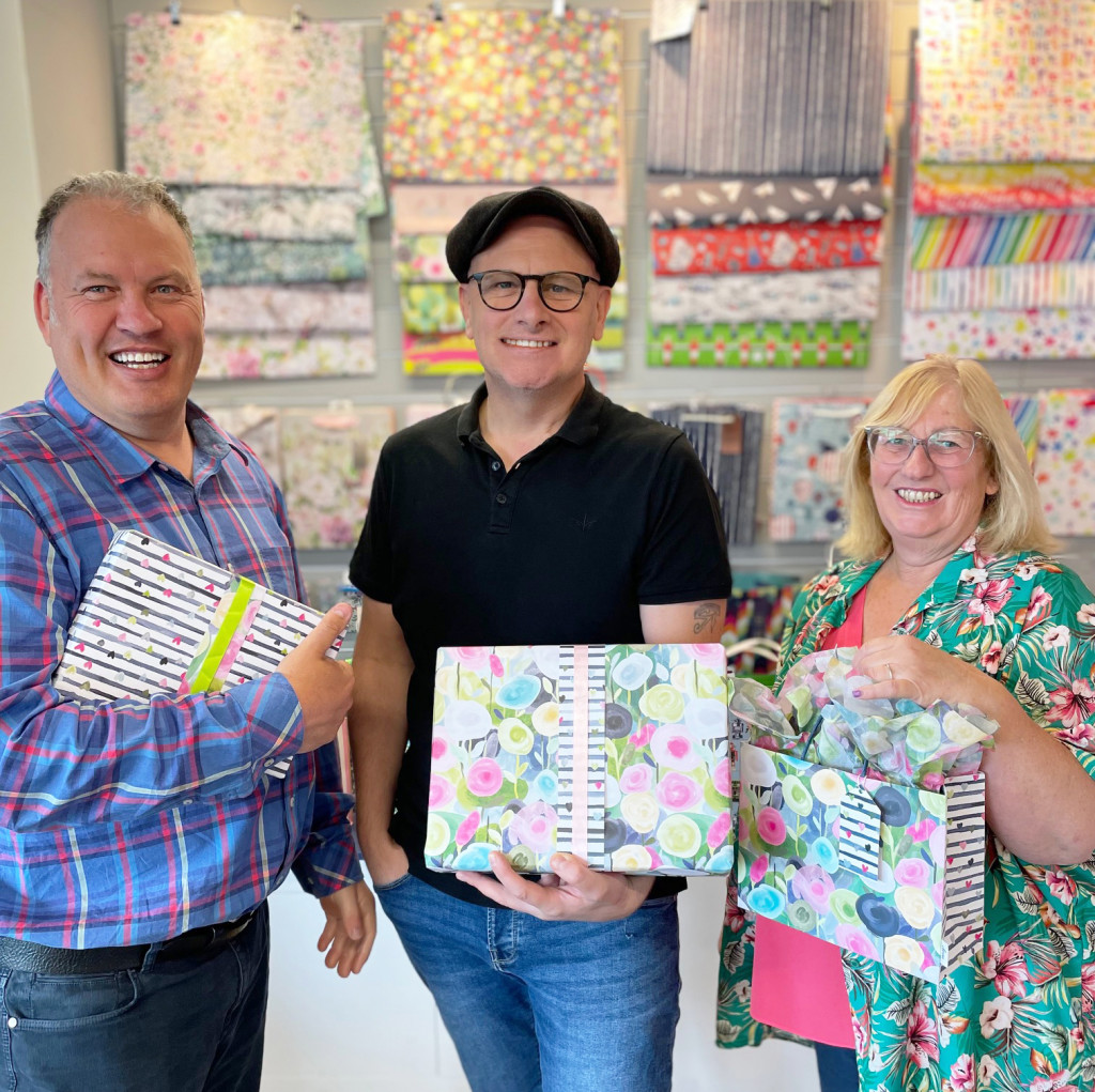 Above: Deva Designs md Andrew Maddock (left), designer Reuben Duffy, and admin director Ann Rogers are full of pride