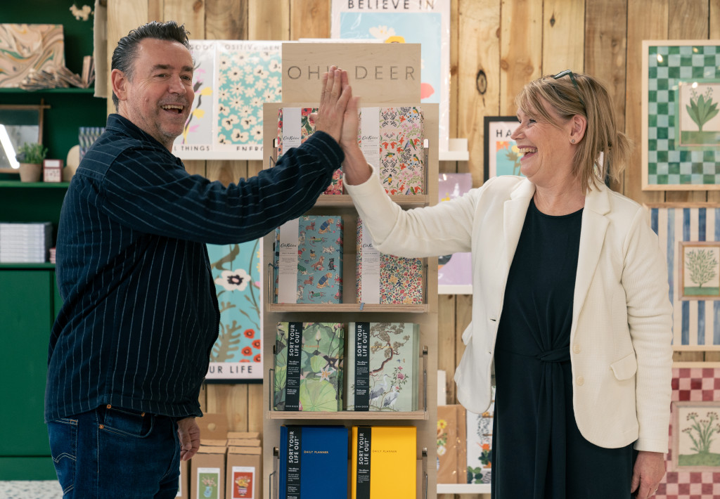 Above: A high five from agent Reg Shaw to Celia on the new department