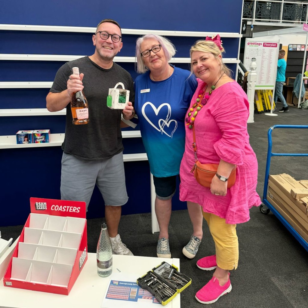 Above: A very happy Dean Morris (stand 312) with PG’s Jakki Brown and Tracey Arnaud: “Lovely to be presented with some bubbles and a cute gift to celebrate my 25 years in the industry this year. That will certainly be drunk during the duration of this show, thank you!”