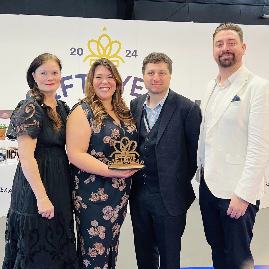 Above: Stacey and Jamie McNeill (centre) collect the trophy from GA ceo Sarah Ward and David Westbrooke, show manager for Home & Gift organiser Clarion Events