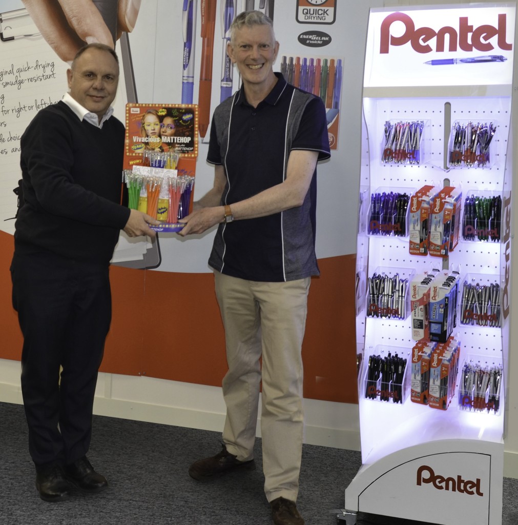 Above: Ray (right) collects his prize from John Cotterell