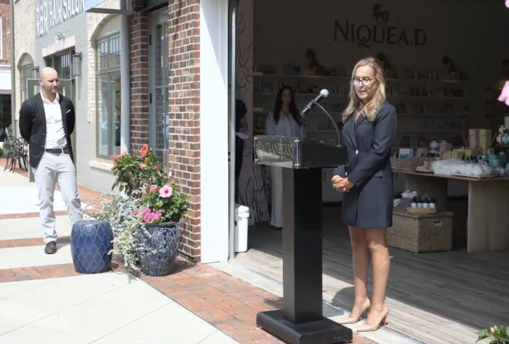 Above: Dominique and son Jonathan at the opening of her first Niquea.D store