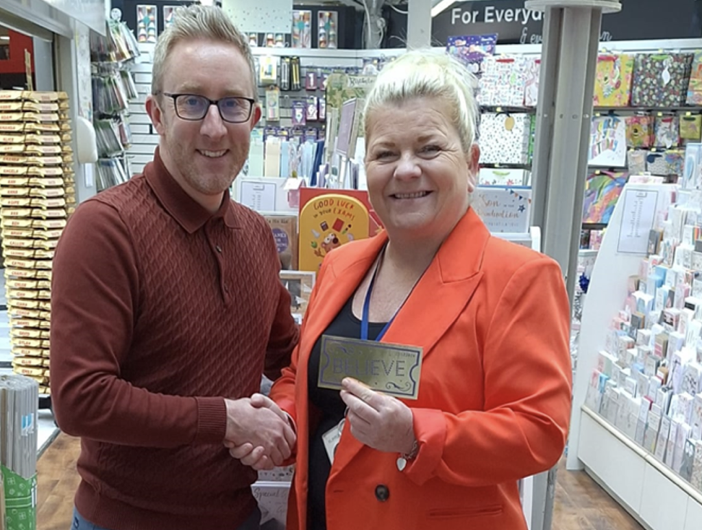 Above: At Card Gallery, agent Mark Delaney presented the prize to manager Linda Reid, who said: “I was so happy to win the Golden Ticket – it’s a great promotion and, as I always say, IC&G are the best!”