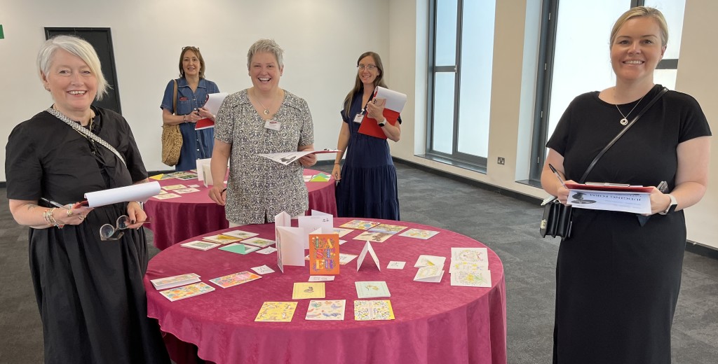 Above: (left-right) Jo Webber of Jo Amor, Deb Came of Paperweight, Sarah Laker of Stationery Supplies, Lauren Thomas of Tesco, and Sam Ody of Cardzone in Henries judging mode