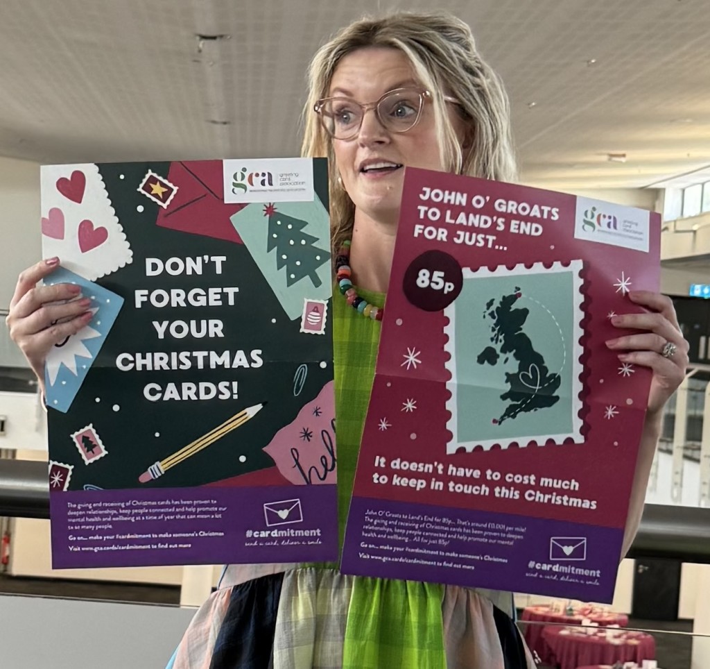 Above: Raspberry Blossom’s Rebecca Green showing some of the poster assets available for this year’s #Cardmitment campaign for retailers to use