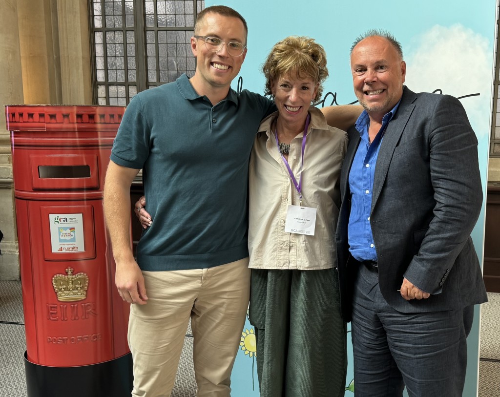 Above: James with mum Chris and dad Paul at the conference