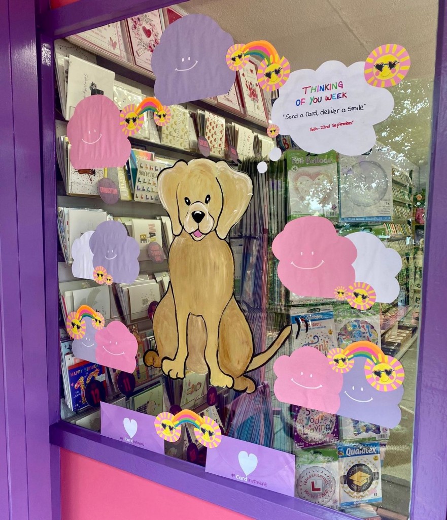 Above & top: At Cardies in Stevenage shop dog Orberry is telling customers about TOYW