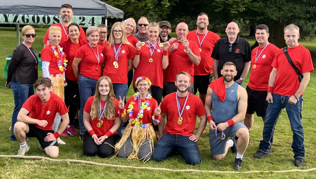 Above: Windles’ victorious team in the company’s red shirts