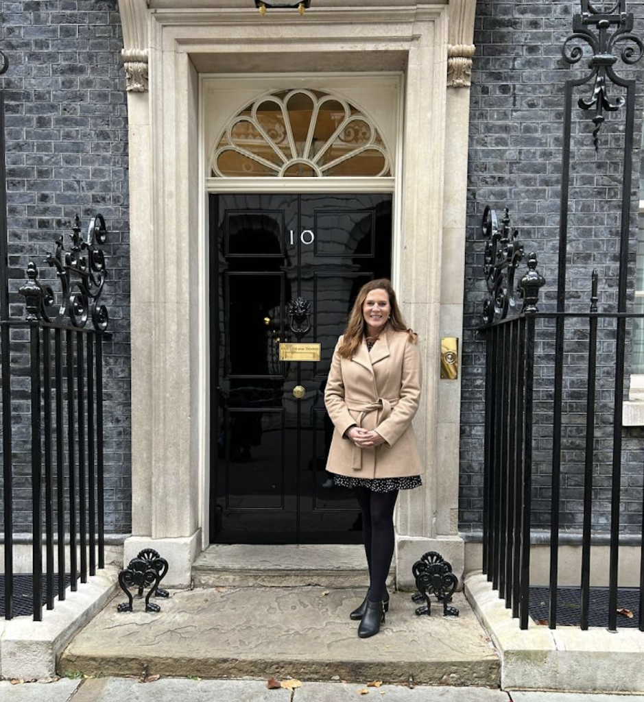 Above & top: Hannah and the iconic doorway into the prime minister’s residence