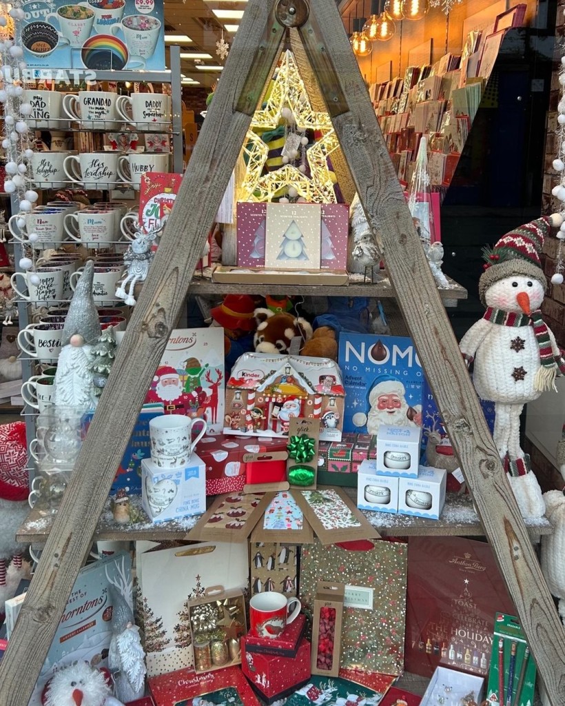 Above: So many favourite things in the Henry & Co display in Ormskirk – chocolates, mugs, candles and stationery and a cute snowman waiting patiently for a forever home