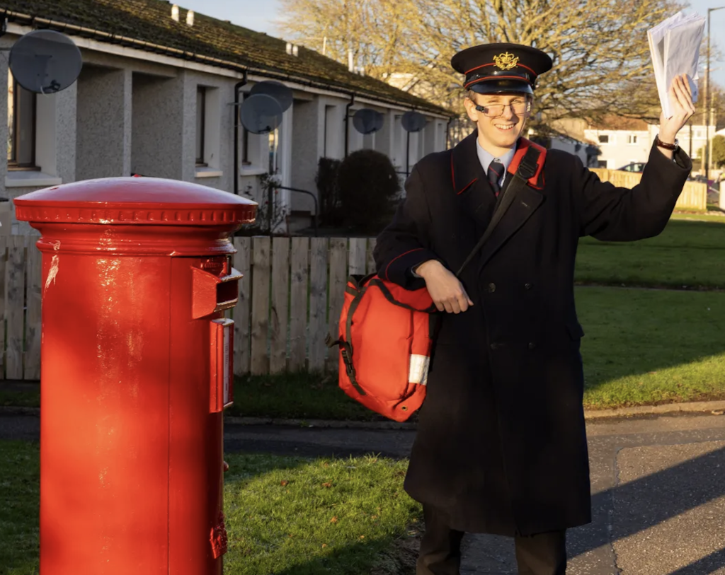 Above & top: Postie Jack Leslie is warm and toasty in his 1950s outfit (Pic from the Scottish Sun/credit: Paul Reid)