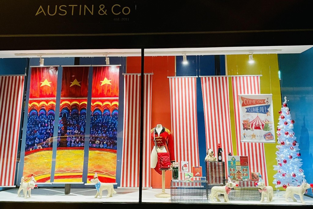 Above: Austin & Co may be a small indie in Malvern with a budget for window dressing in the hundreds, but owner Sean Austin still likes to think big when it comes to the most important shop window of the year – this year there’s a bit of a circus theme to go with the dogs!